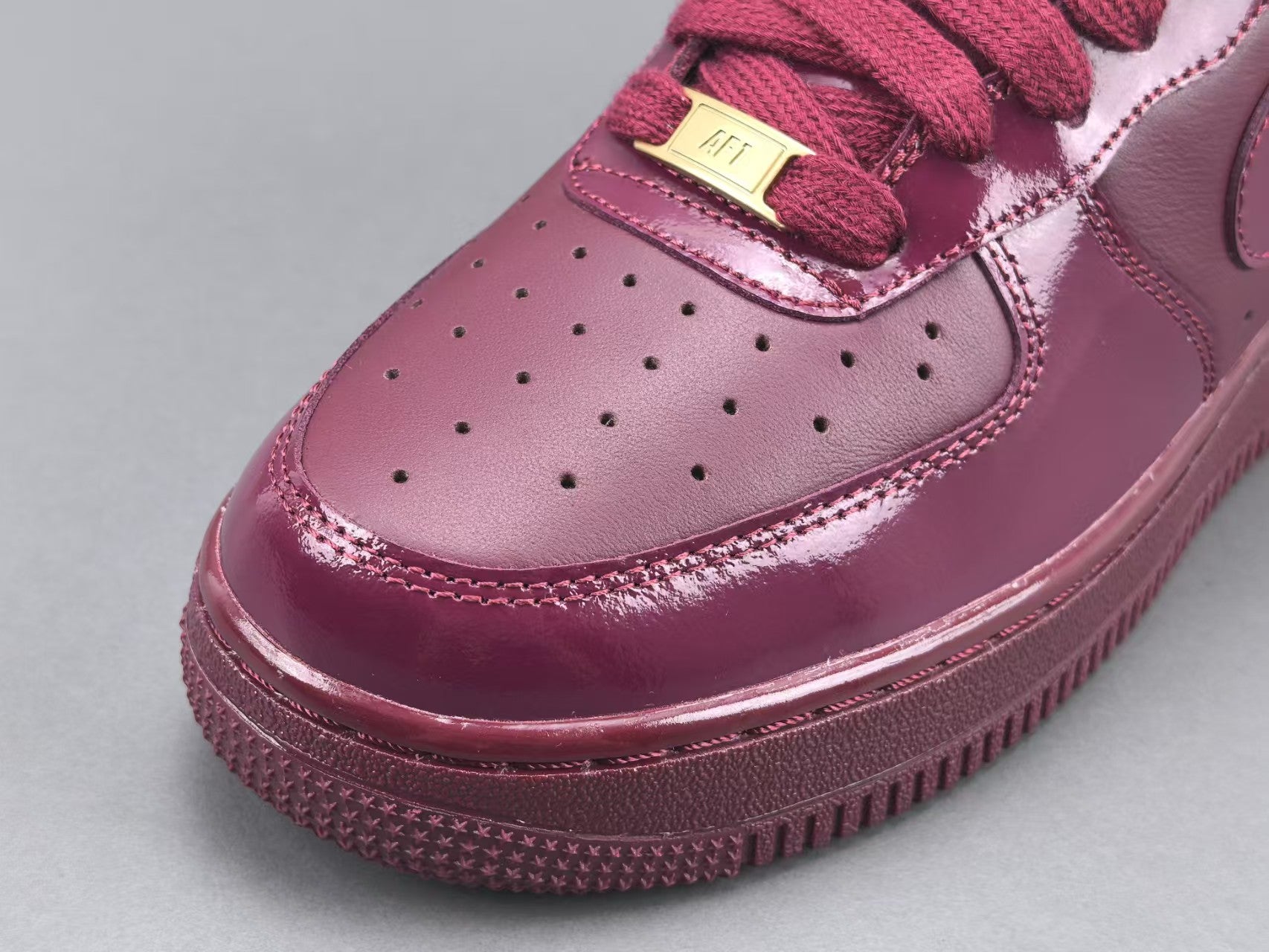 Burgundy Patent Leather Low Top Sneakers