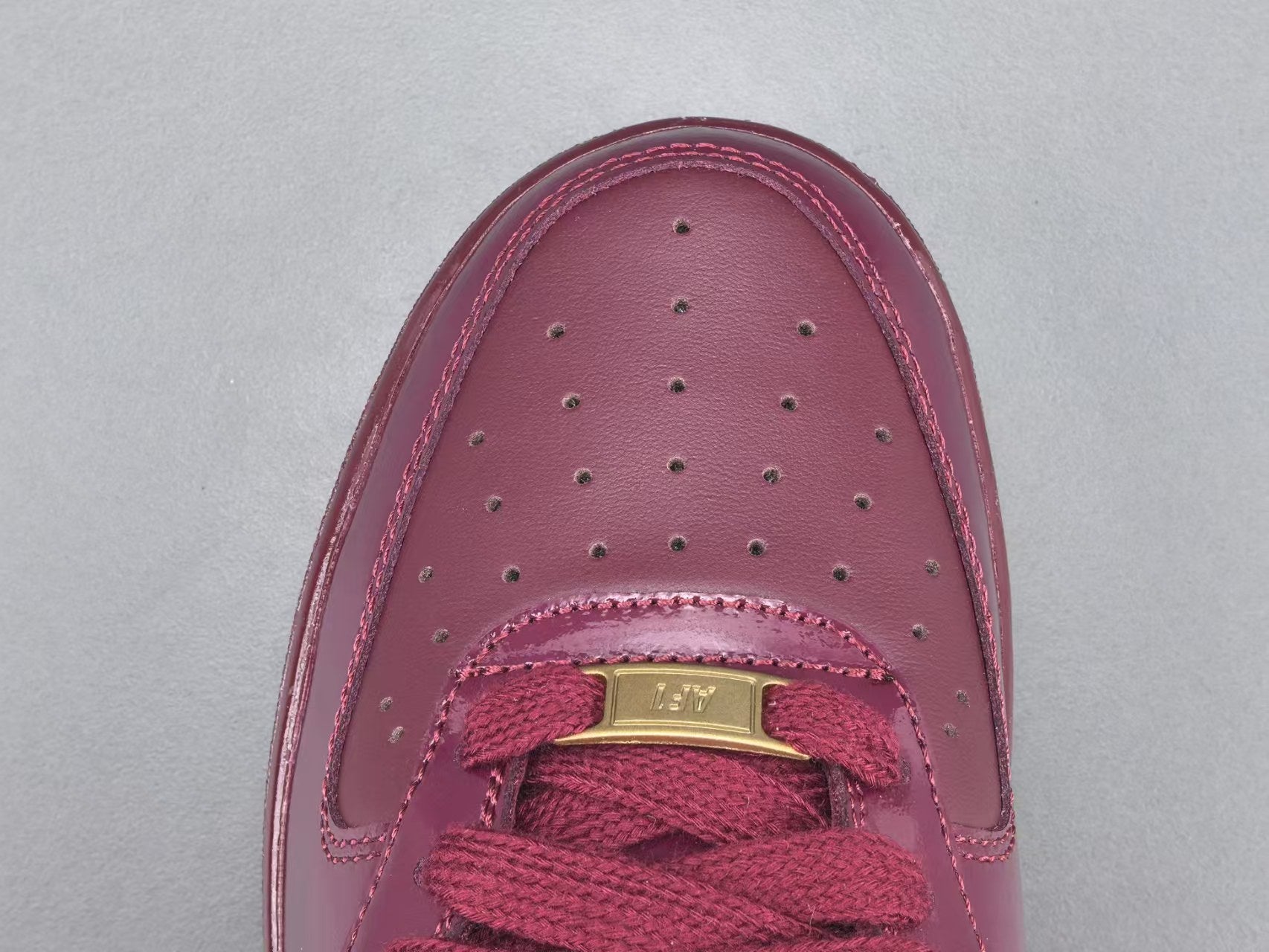 Burgundy Patent Leather Low Top Sneakers