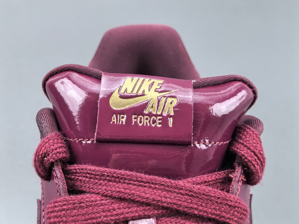 Burgundy Patent Leather Low Top Sneakers