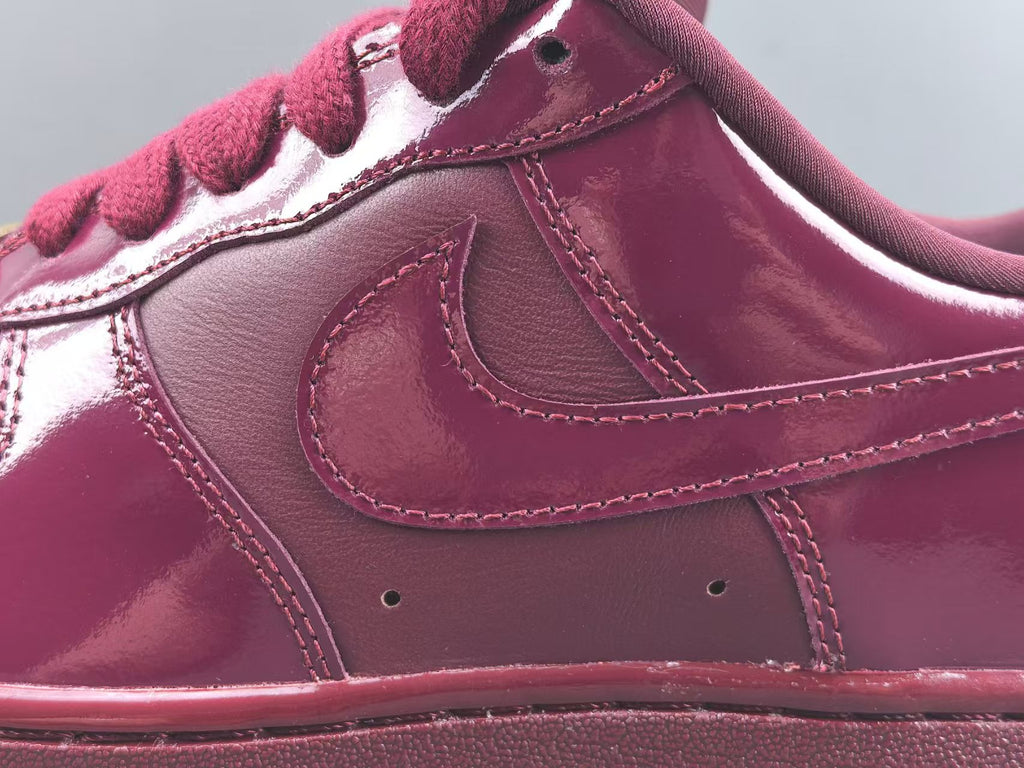 Burgundy Patent Leather Low Top Sneakers