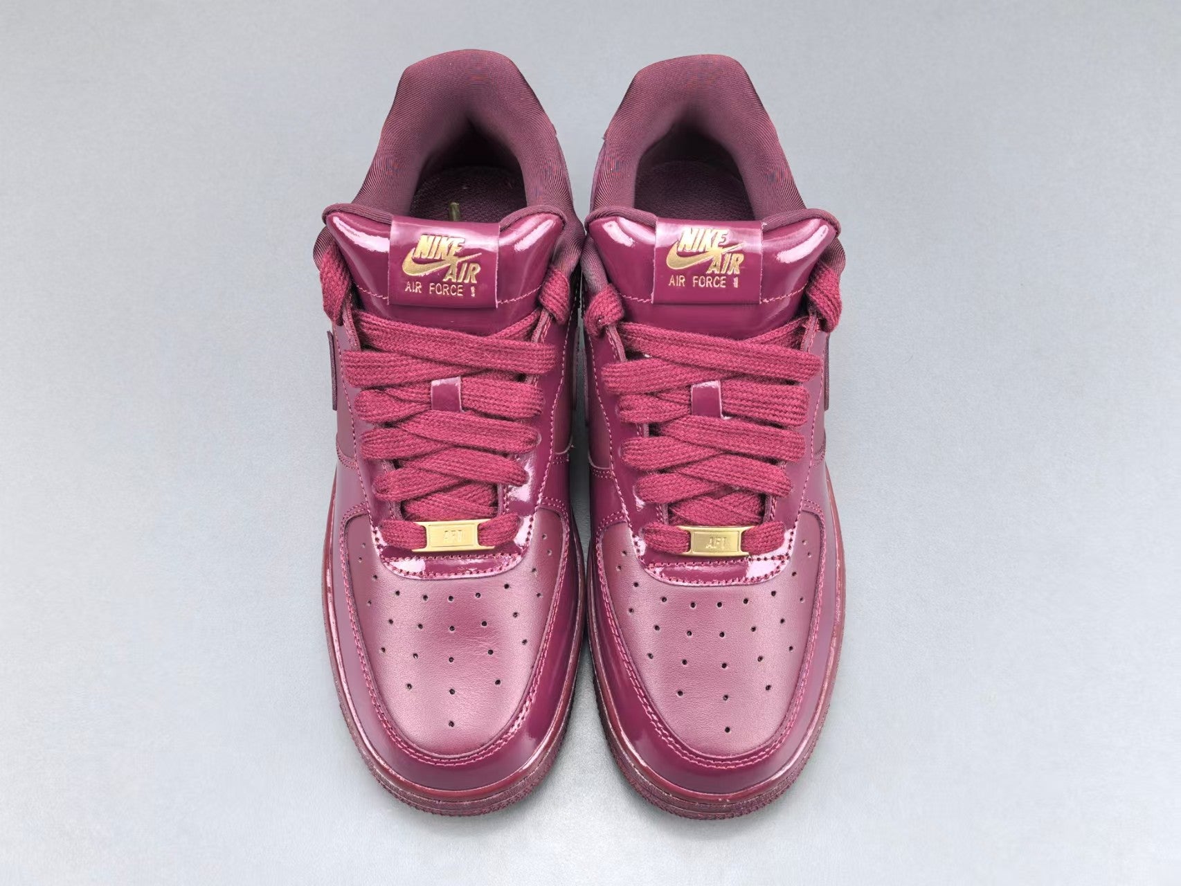 Burgundy Patent Leather Low Top Sneakers