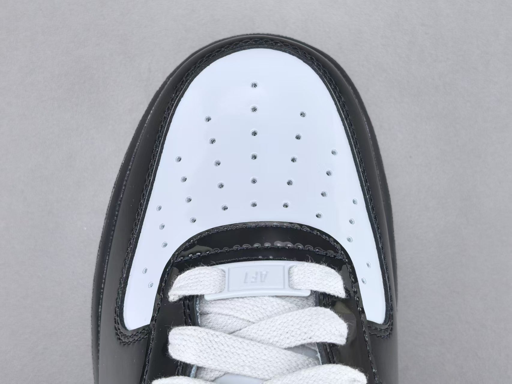 Black & White Patent Leather Low Top Sneakers
